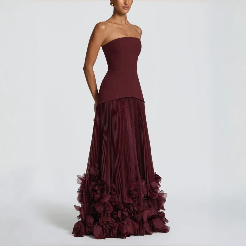 Abito elegante bordeaux plissettato con motivo floreale a gigli