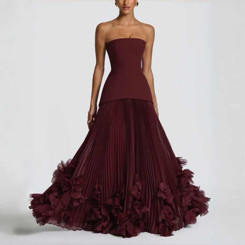 Abito elegante bordeaux plissettato con motivo floreale a gigli