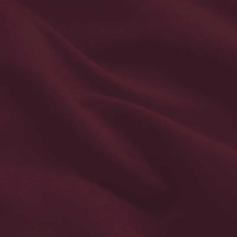 Abito elegante bordeaux plissettato con motivo floreale a gigli