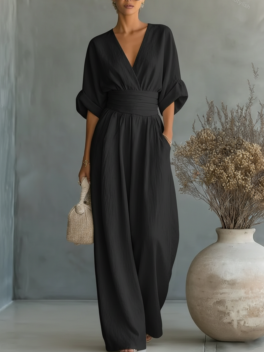 Elegante tuta intera scollo a V con vita alta
