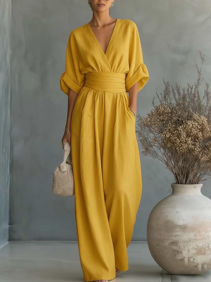 Elegante tuta intera scollo a V con vita alta