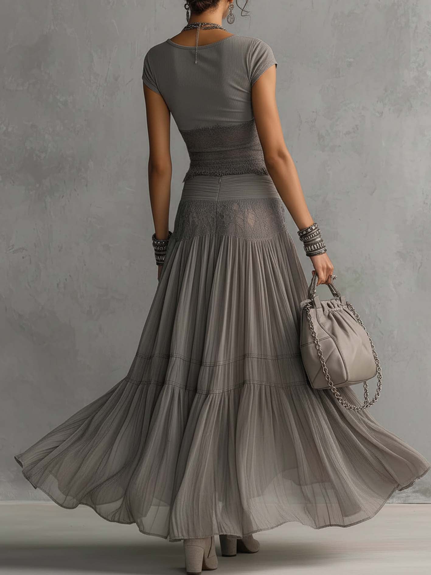 Completo Elena con top in pizzo e maxi gonna plissettata