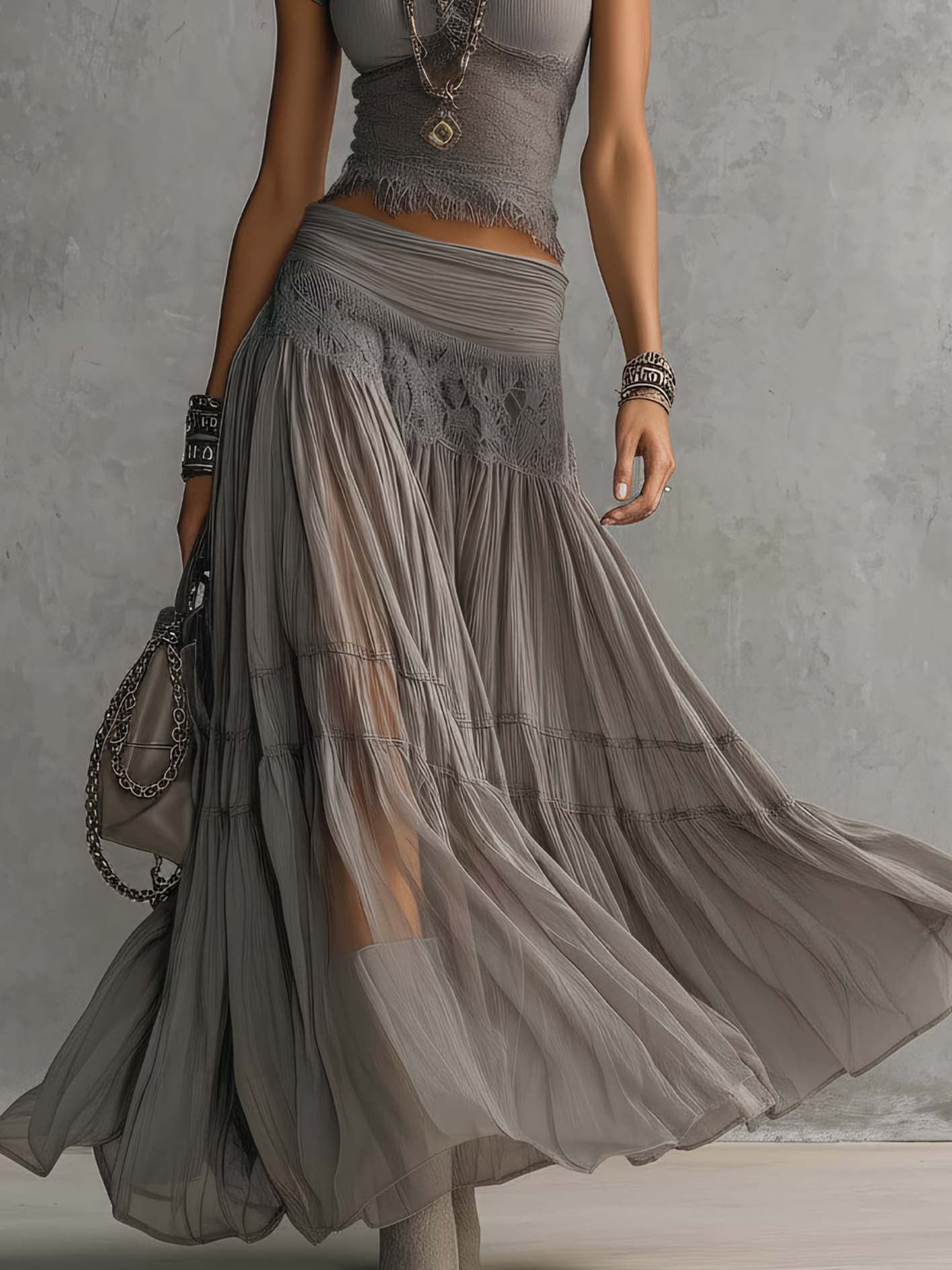 Completo Elena con top in pizzo e maxi gonna plissettata