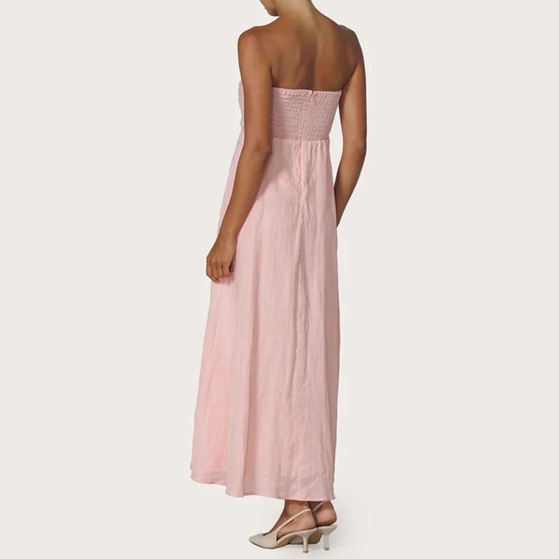 Abito lungo elegante con top a fascia e linea fluida