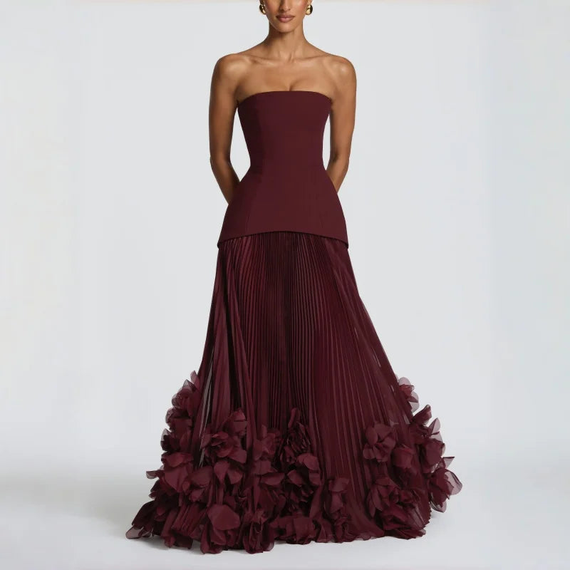 Abito elegante bordeaux plissettato con motivo floreale a gigli