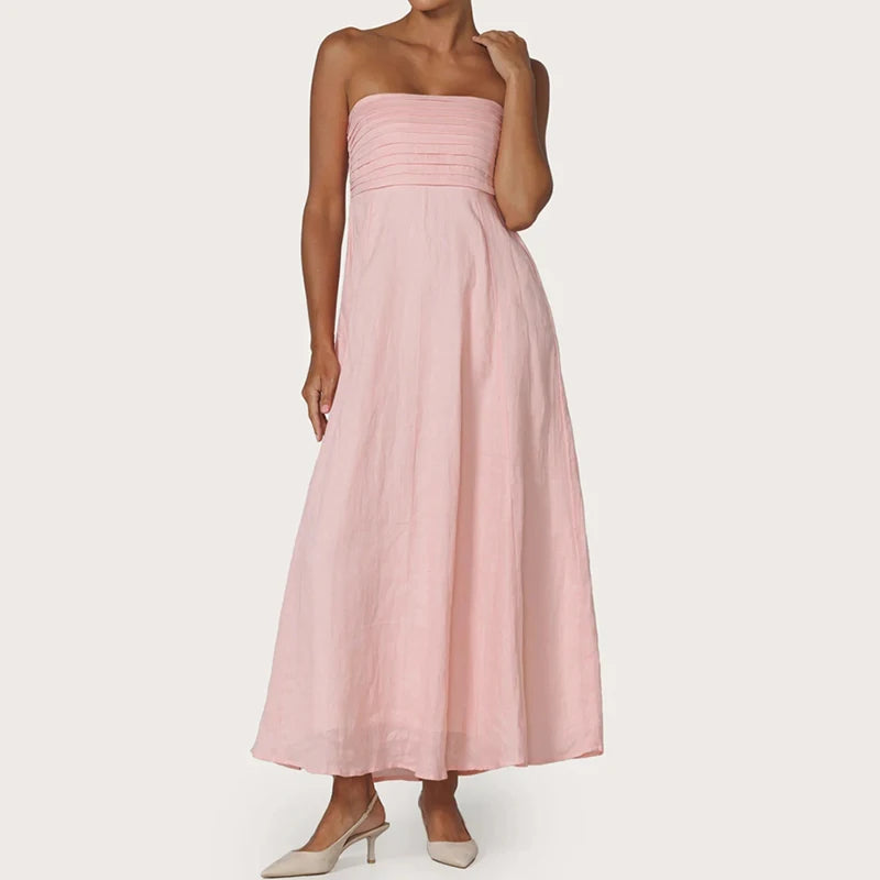Abito lungo elegante con top a fascia e linea fluida