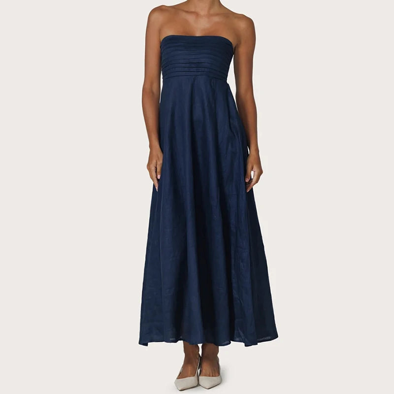 Abito lungo elegante con top a fascia e linea fluida